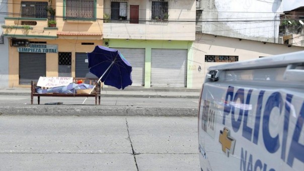 Corpse wrapped in plastic and casket lying in Ecuador